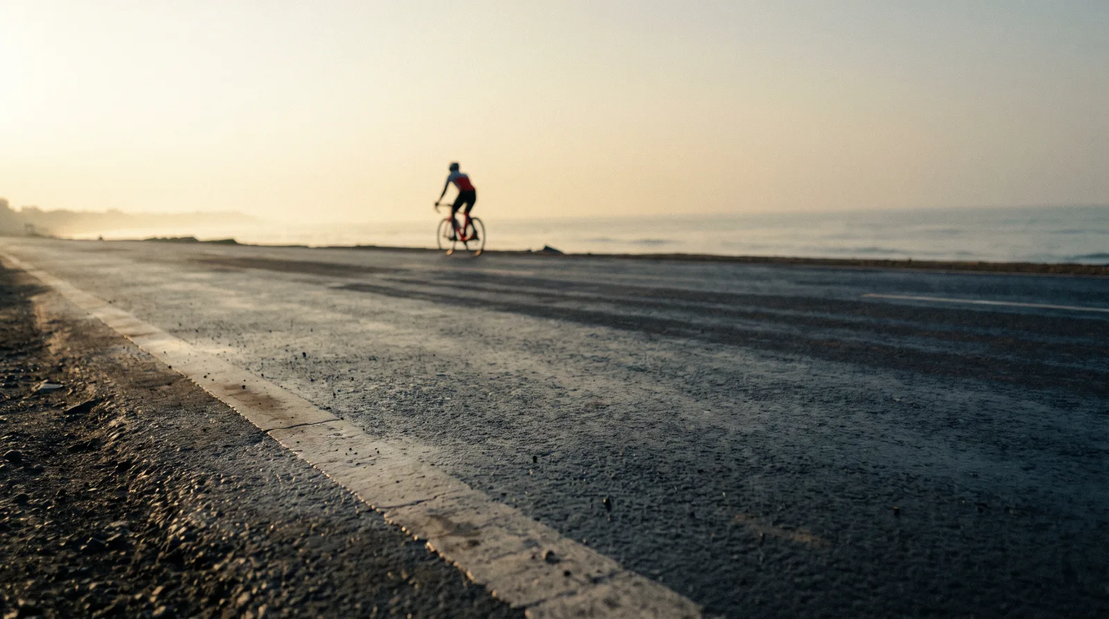Wet road surface at first light.